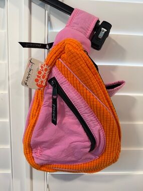 Fp movement new with tags  Pink Quilted Sling Bag with Orange Trim